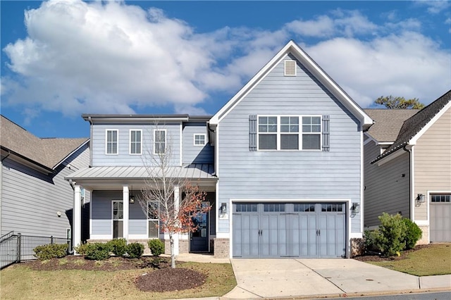 view of front of home with a garage and a front lawn