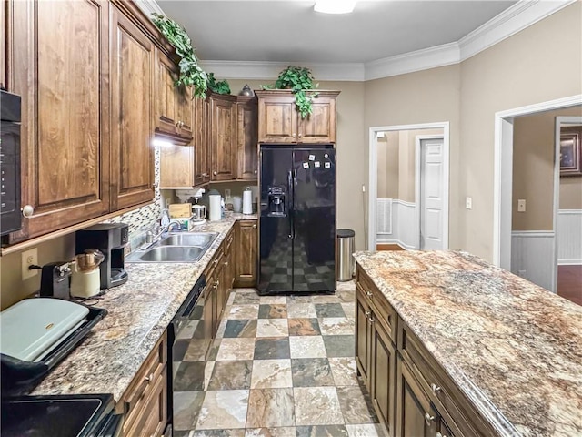 kitchen with a sink, dishwashing machine, black refrigerator with ice dispenser, and crown molding