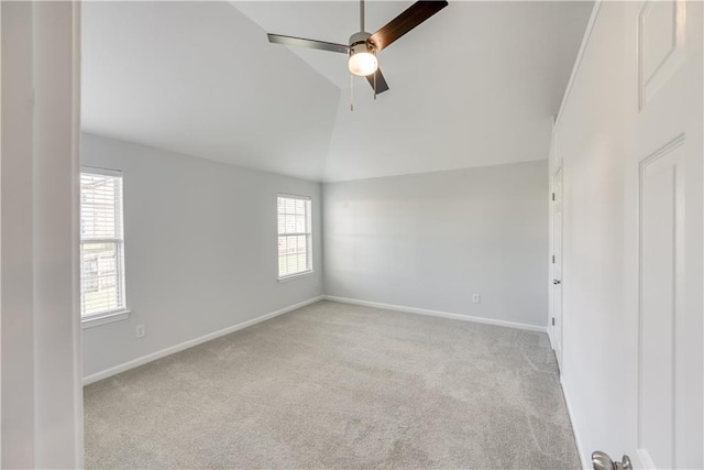 carpeted empty room with plenty of natural light, baseboards, and ceiling fan