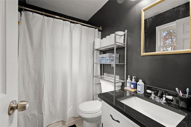 bathroom featuring vanity, tile patterned floors, a shower with shower curtain, toilet, and a textured ceiling