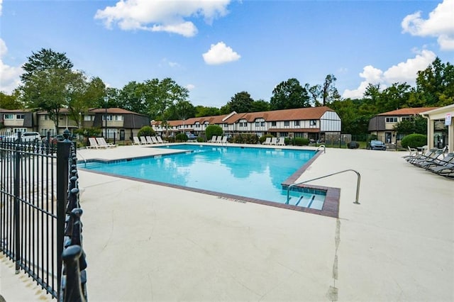 view of pool featuring a patio