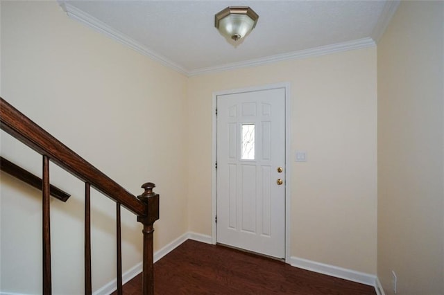 foyer featuring ornamental molding and dark wood-type flooring