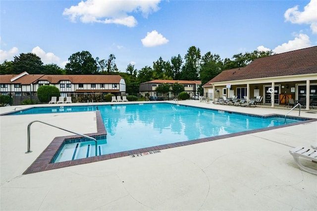 view of swimming pool featuring a patio