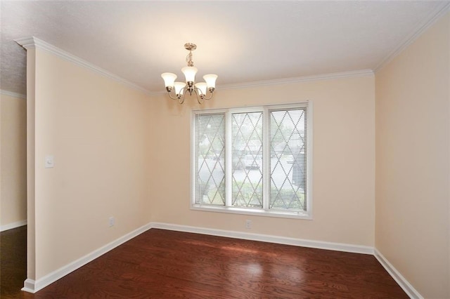 empty room with dark hardwood / wood-style flooring, crown molding, and a chandelier