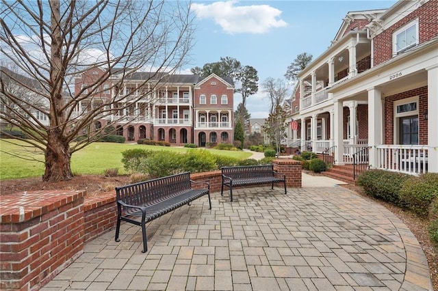 surrounding community featuring a patio area