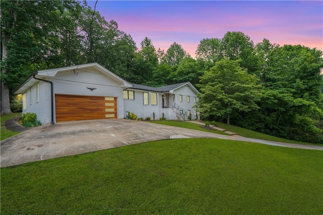 4025 Cheoah Dr, Douglasville, GA 30135 - view of front of house featuring driveway, a front yard, a garage, and brick siding