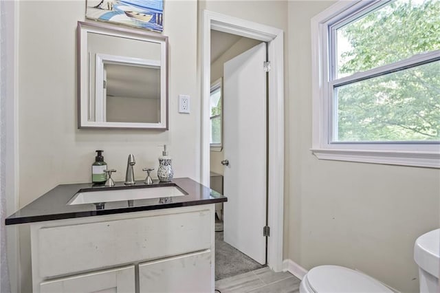 4025 Cheoah Dr, Douglasville, GA 30135 - half bath with toilet, vanity, and baseboards