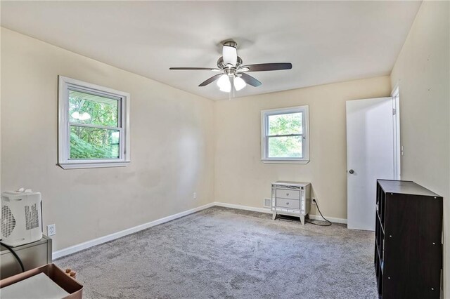 4025 Cheoah Dr, Douglasville, GA 30135 - unfurnished bedroom with carpet flooring, baseboards, and a ceiling fan