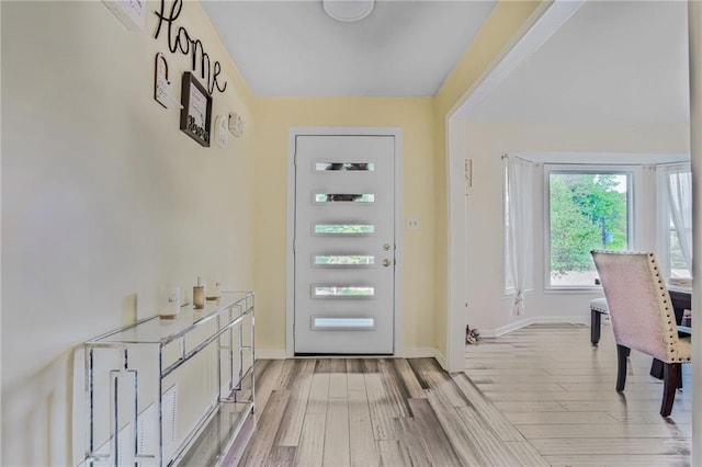 4025 Cheoah Dr, Douglasville, GA 30135 - entryway featuring light wood-type flooring and baseboards