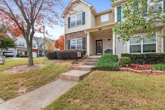 view of front of house featuring a front lawn