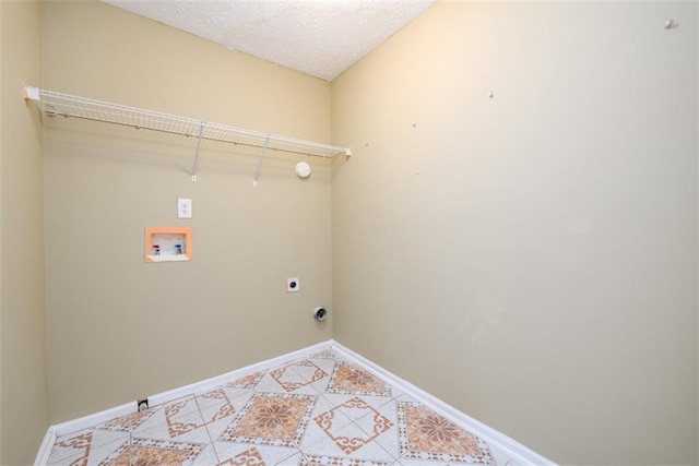 1188 Pine Acre Dr, Sugar Hill, GA 30518 - laundry area featuring washer hookup, electric dryer hookup, baseboards, and light tile patterned floors