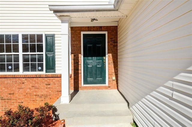 1188 Pine Acre Dr, Sugar Hill, GA 30518 - view of exterior entry featuring brick siding
