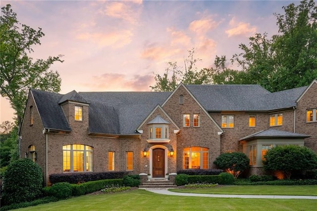 view of front of home featuring a yard