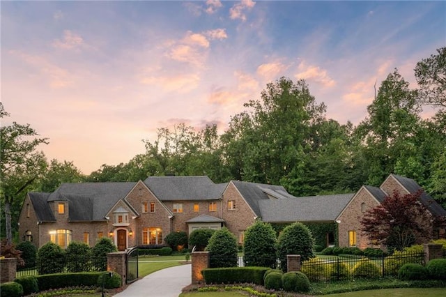 view of front of property with a yard