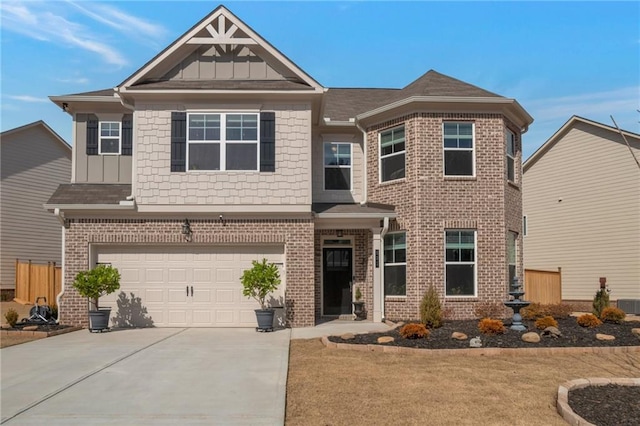 craftsman-style home featuring a front yard and a garage