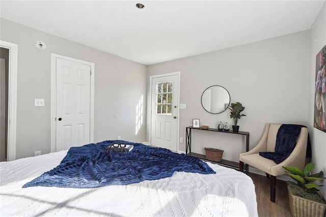 bedroom with wood-type flooring