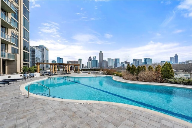 view of pool featuring a patio area