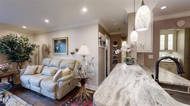 living area featuring recessed lighting, crown molding, and wood finished floors