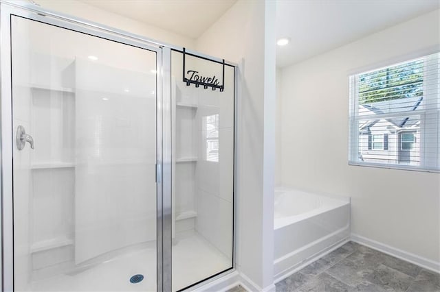 bathroom with independent shower and bath