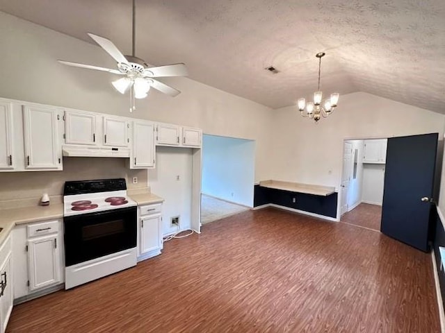 60 Parkman Trl, Covington, GA 30016 - kitchen with electric stove, lofted ceiling, under cabinet range hood, white cabinetry, and a chandelier
