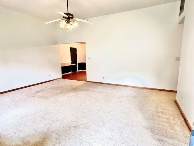 60 Parkman Trl, Covington, GA 30016 - unfurnished room with carpet, ceiling fan, baseboards, and high vaulted ceiling