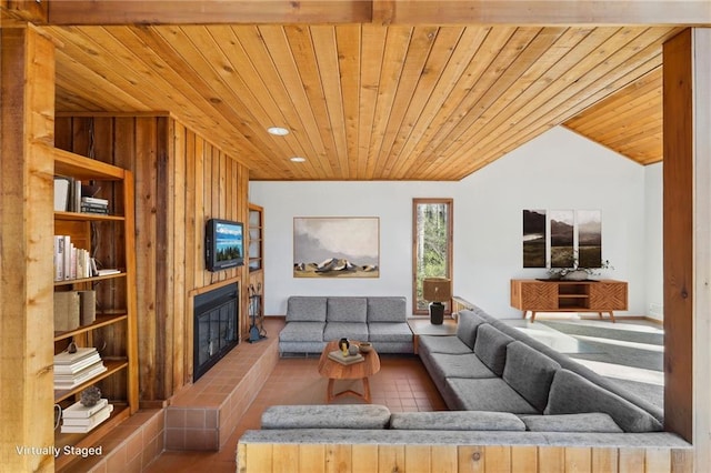 sunken living room with wood ceiling and a fireplace