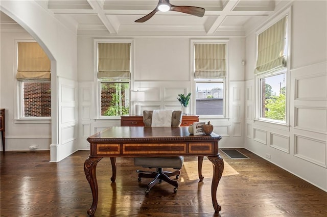 office area with coffered ceiling, a decorative wall, and beamed ceiling