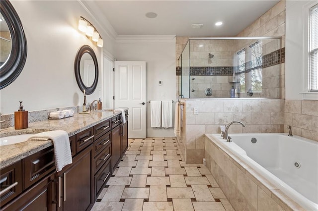 bathroom featuring crown molding, double vanity, a tub with jets, and a stall shower