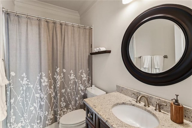 bathroom with crown molding, toilet, curtained shower, and vanity