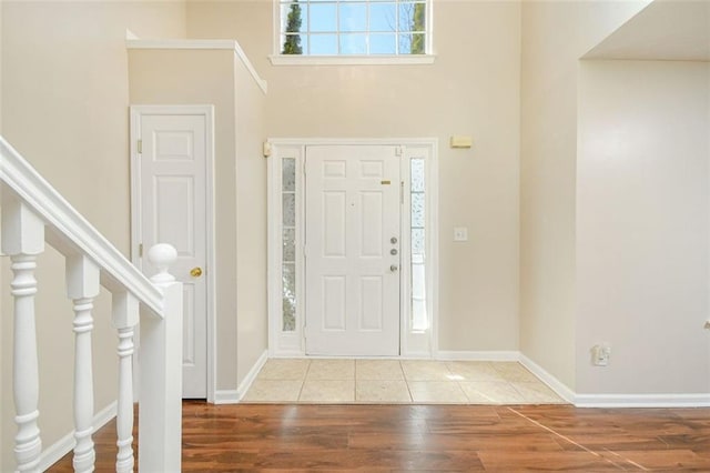 foyer with light hardwood / wood-style flooring