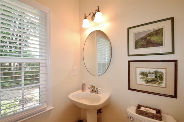 340 Channings Lake Dr, Lawrenceville, GA 30043 - half bathroom featuring plenty of natural light