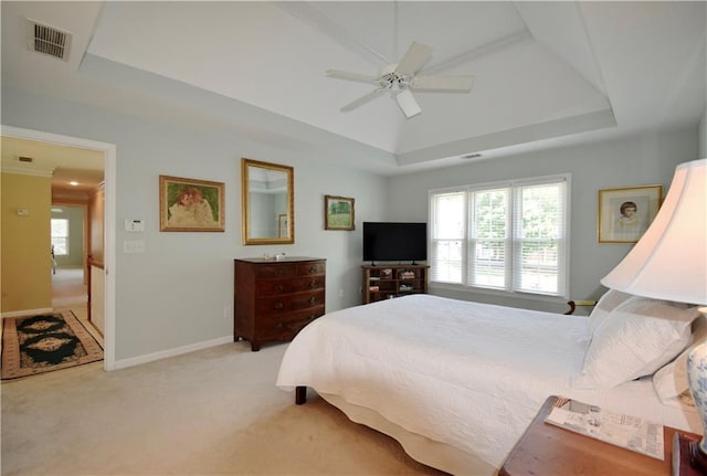 340 Channings Lake Dr, Lawrenceville, GA 30043 - bedroom featuring a raised ceiling, light carpet, and ceiling fan