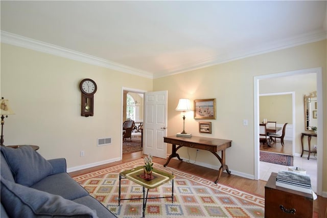 340 Channings Lake Dr, Lawrenceville, GA 30043 - living room featuring crown molding and light wood-type flooring
