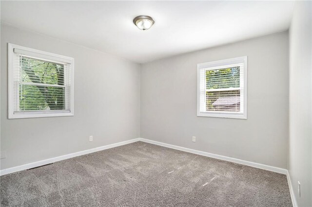 2623 Rex Ave SW, Atlanta, GA 30331 - spare room featuring baseboards and carpet floors