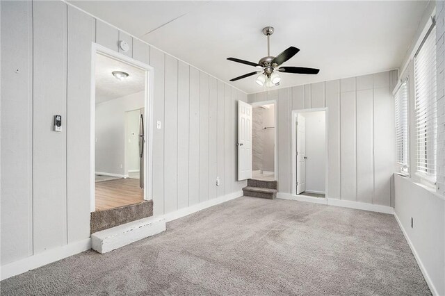 2623 Rex Ave SW, Atlanta, GA 30331 - unfurnished bedroom featuring a ceiling fan, baseboards, and carpet floors