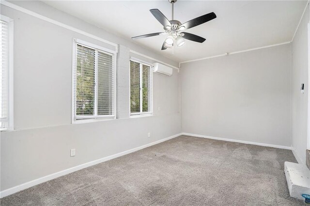 2623 Rex Ave SW, Atlanta, GA 30331 - carpeted spare room featuring a ceiling fan, baseboards, and a wall mounted air conditioner