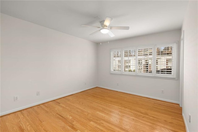 unfurnished room with light hardwood / wood-style floors and ceiling fan