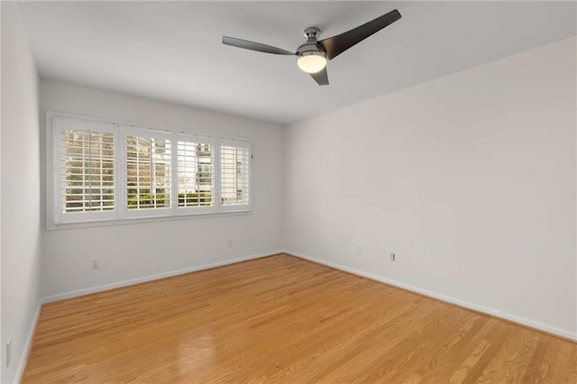 unfurnished room with light hardwood / wood-style flooring and ceiling fan