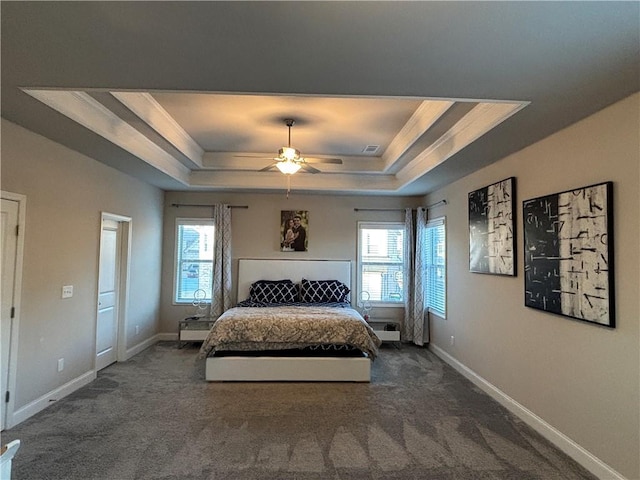 3566 Andover Way, Buford, GA 30519 - carpeted bedroom featuring a tray ceiling, multiple windows, and baseboards