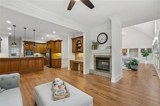119 Kennemer Ct, Duluth, GA 30097 - living room with a ceiling fan, a high end fireplace, recessed lighting, crown molding, and light wood-style flooring