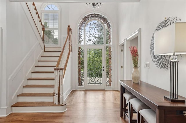 119 Kennemer Ct, Duluth, GA 30097 - foyer with stairs, a high ceiling, and wood finished floors