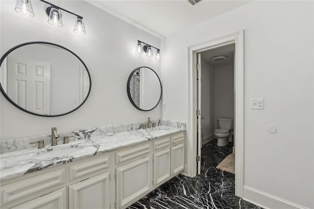 119 Kennemer Ct, Duluth, GA 30097 - full bath with marble look tile flooring, double vanity, toilet, and baseboards