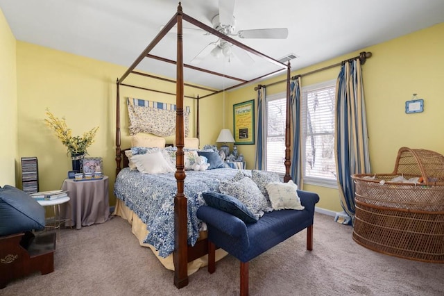 bedroom with a ceiling fan, carpet, visible vents, and baseboards