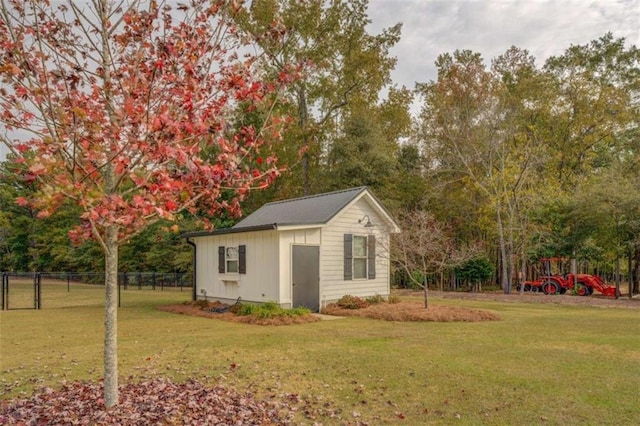 view of outdoor structure with a yard