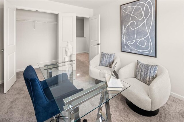 204 Epping St Unit 2, Stockbridge, GA 30281 - living room featuring baseboards and carpet floors