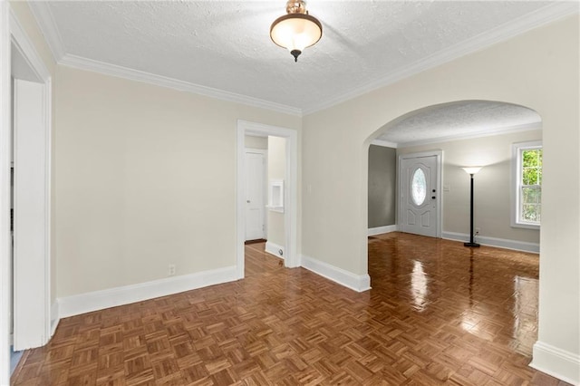 1098 Cascade Cir SW, Atlanta, GA 30311 - unfurnished room featuring arched walkways, a textured ceiling, baseboards, and ornamental molding