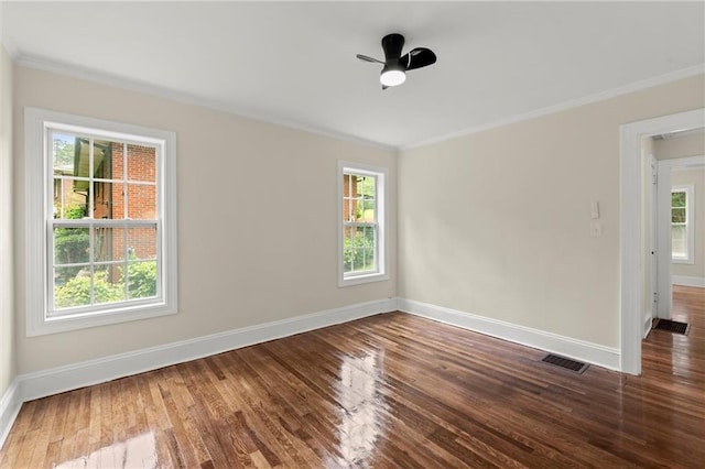 1098 Cascade Cir SW, Atlanta, GA 30311 - unfurnished room featuring crown molding, baseboards, healthy amount of natural light, wood finished floors, and ceiling fan
