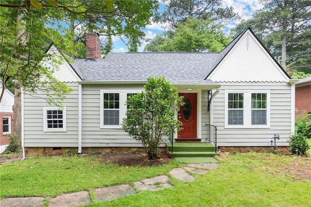 1098 Cascade Cir SW, Atlanta, GA 30311 - tudor house with a chimney, a front lawn, and roof with shingles