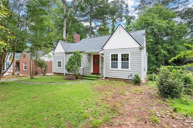 1098 Cascade Cir SW, Atlanta, GA 30311 - view of front of home with a chimney, a front yard, and roof with shingles