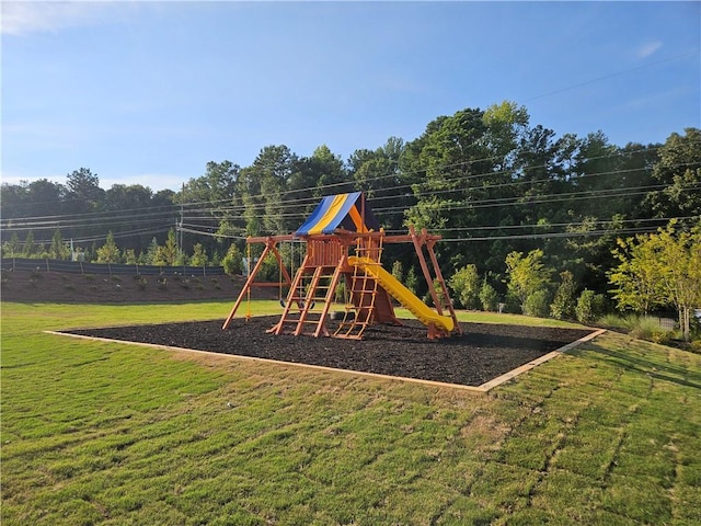 view of play area featuring a lawn